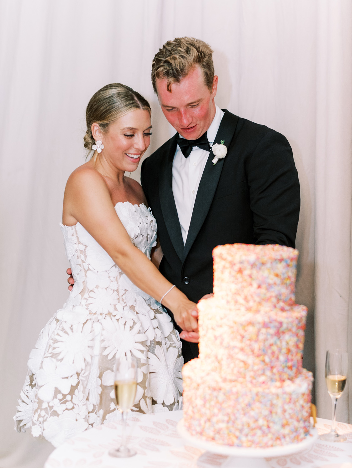 cutest white bridal mini dress and sprinkle wedding cake