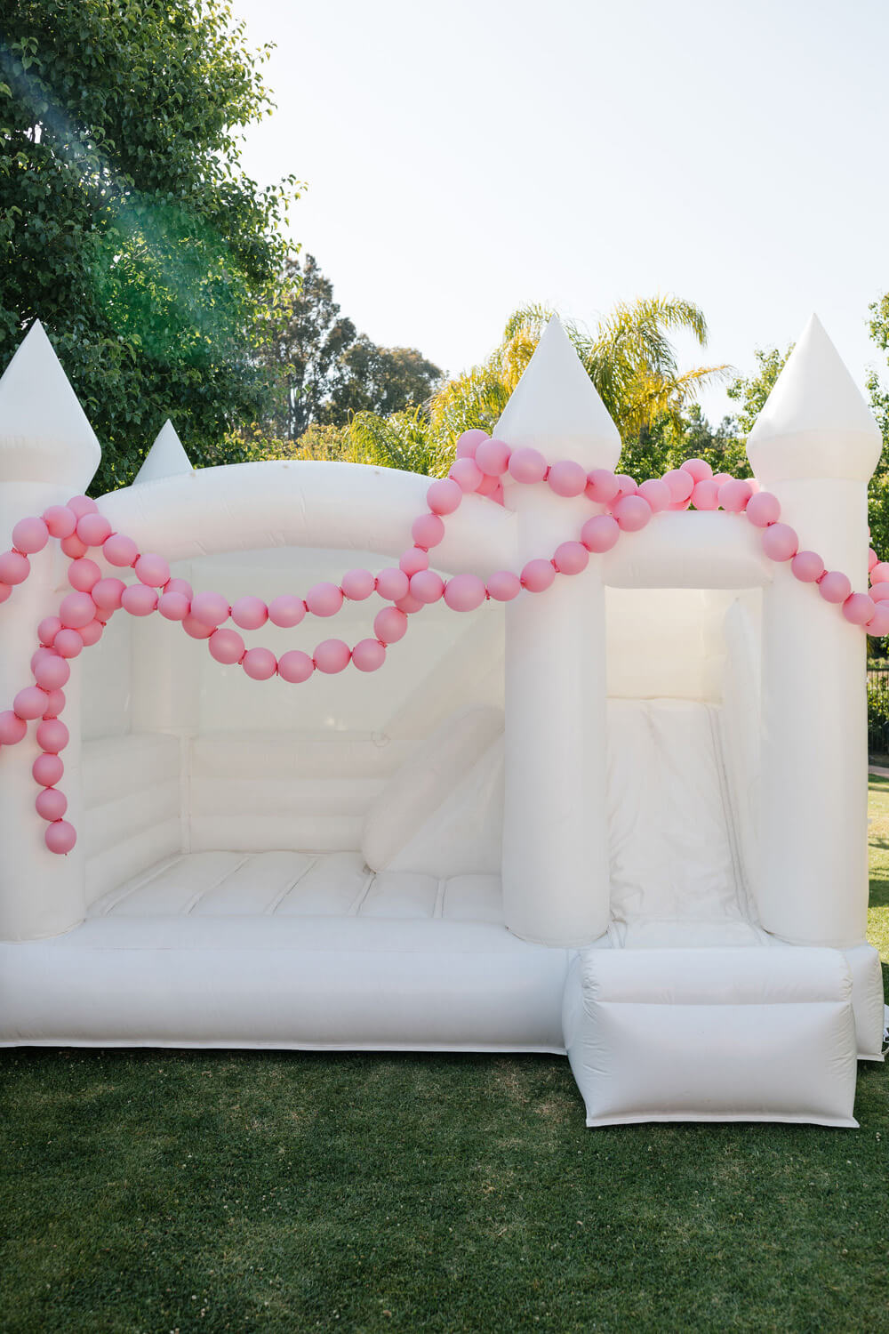 pink and white bounce house