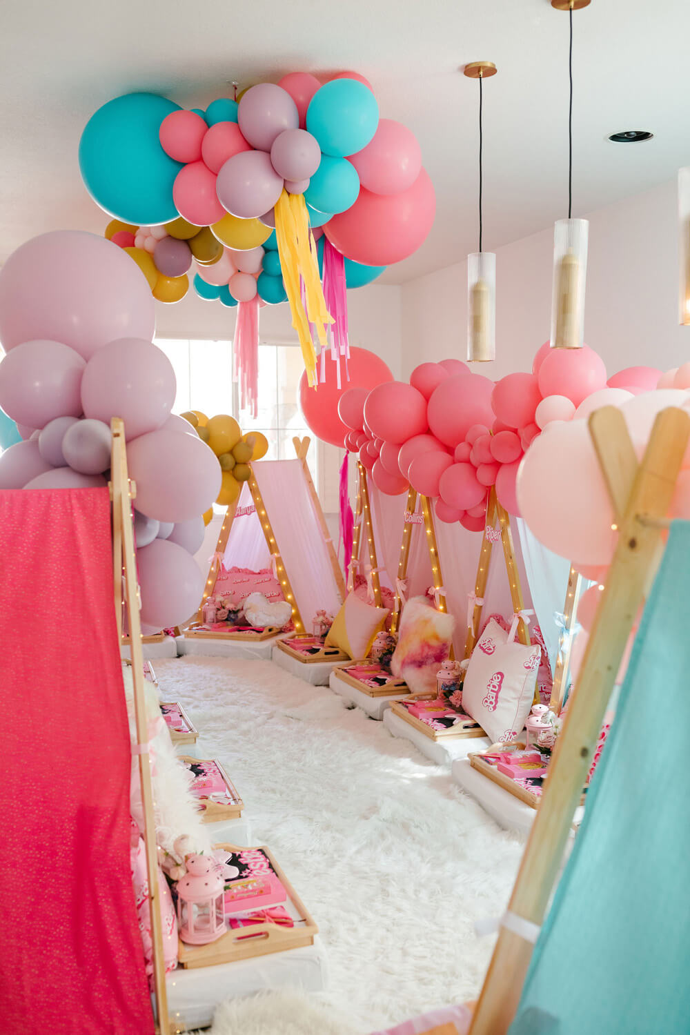 Pink barbie birthday party sleep under with colorful balloon decorations