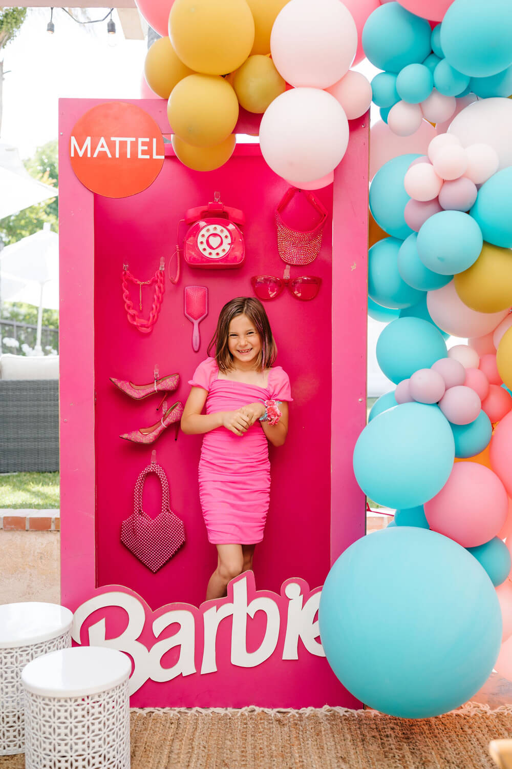 girls photo booth idea for Barbie birthday party