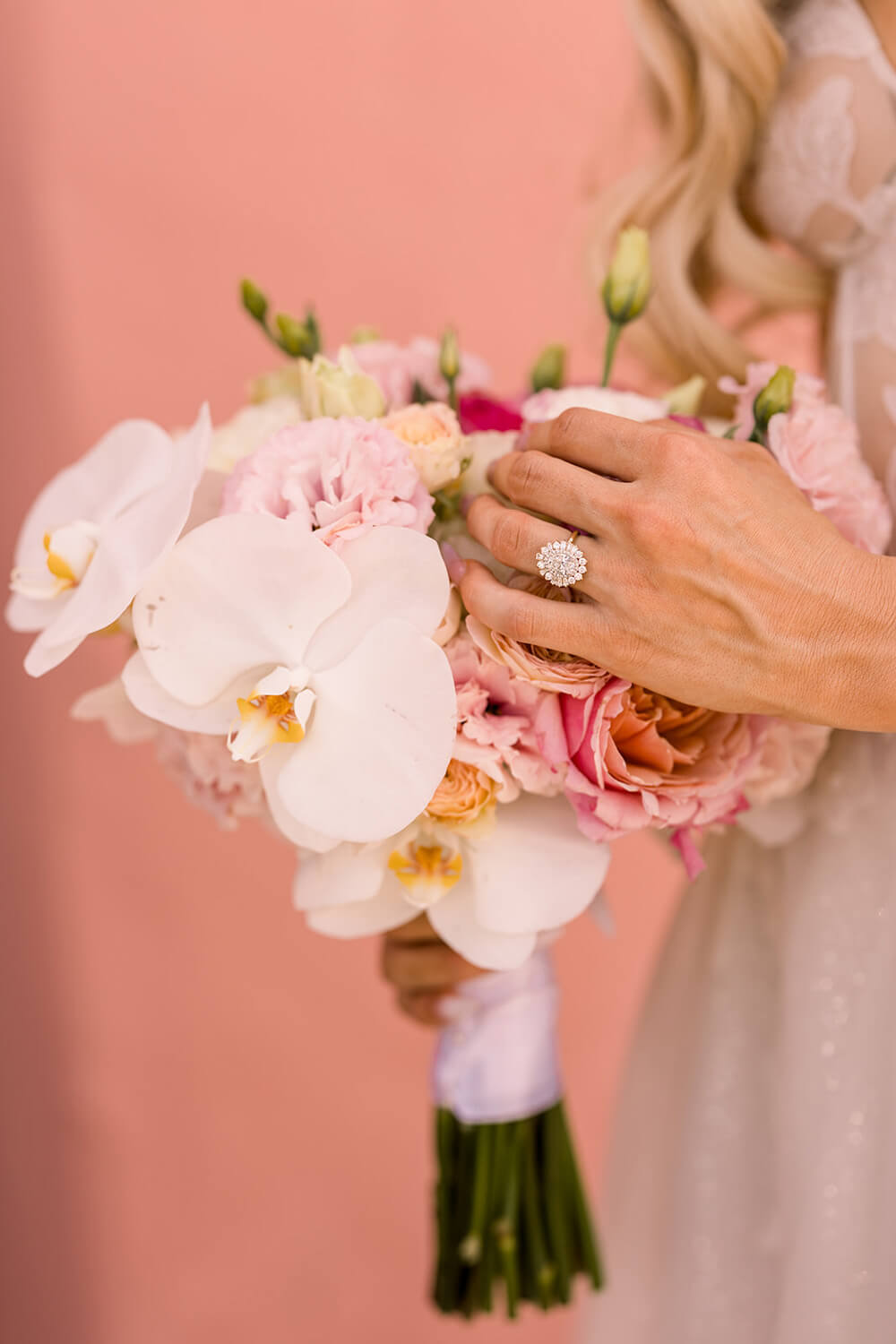 orchid bouquet and engagement ring
