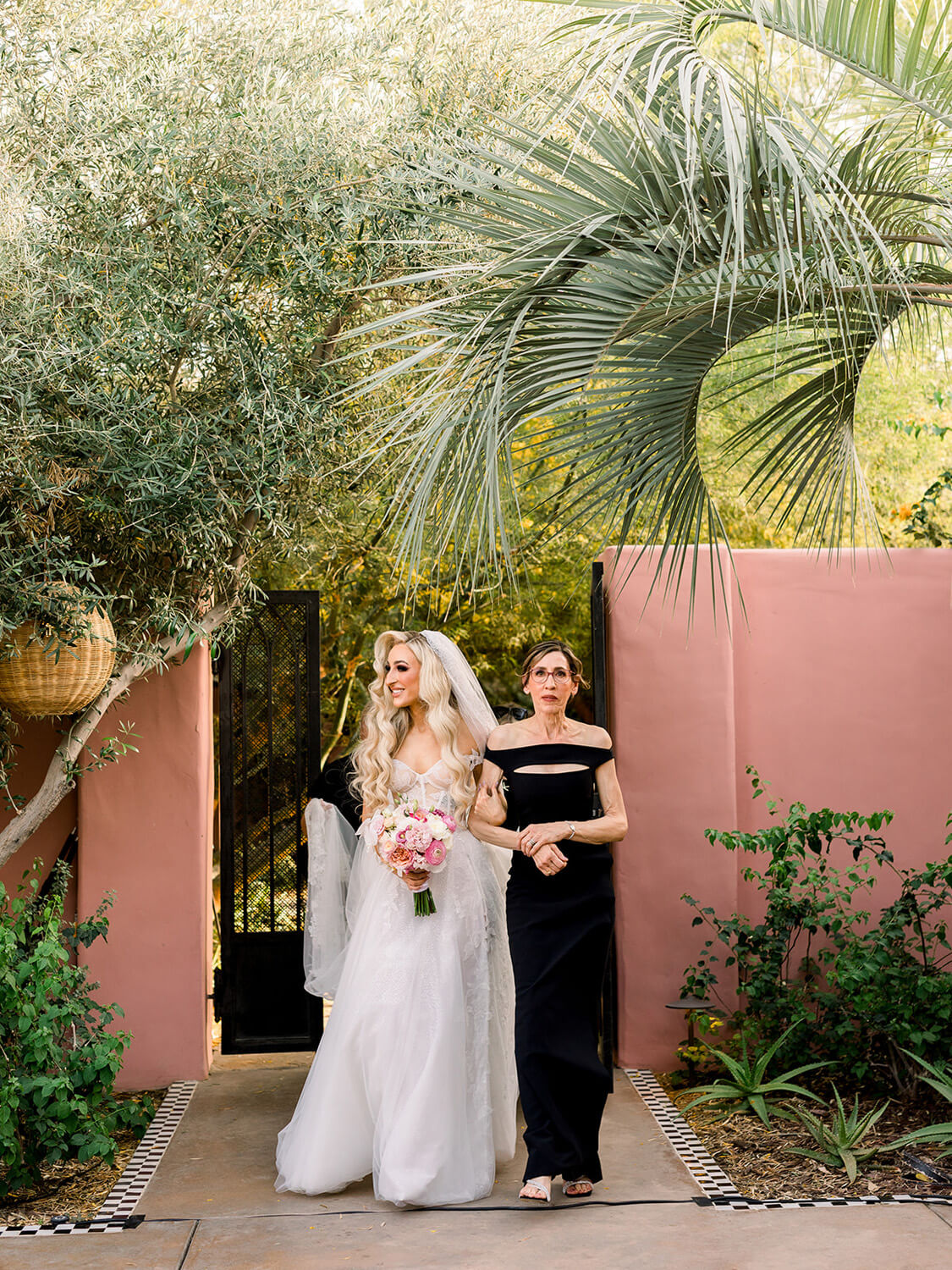 mom walking bride down the aisle