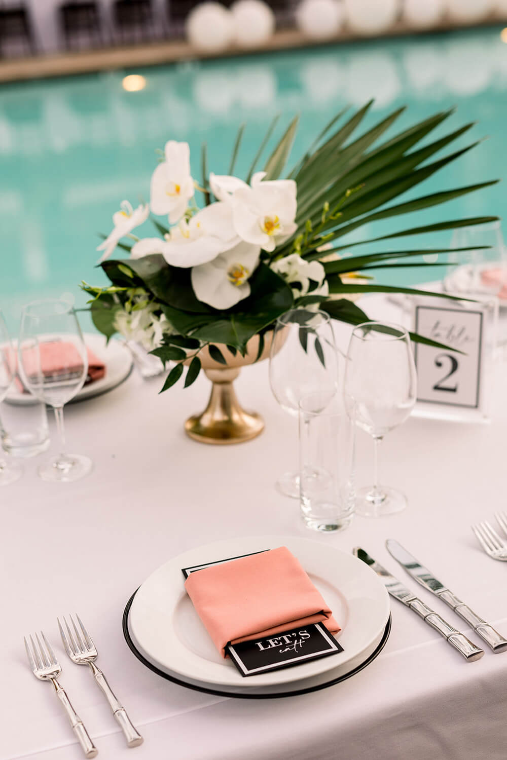 pink and black place settings