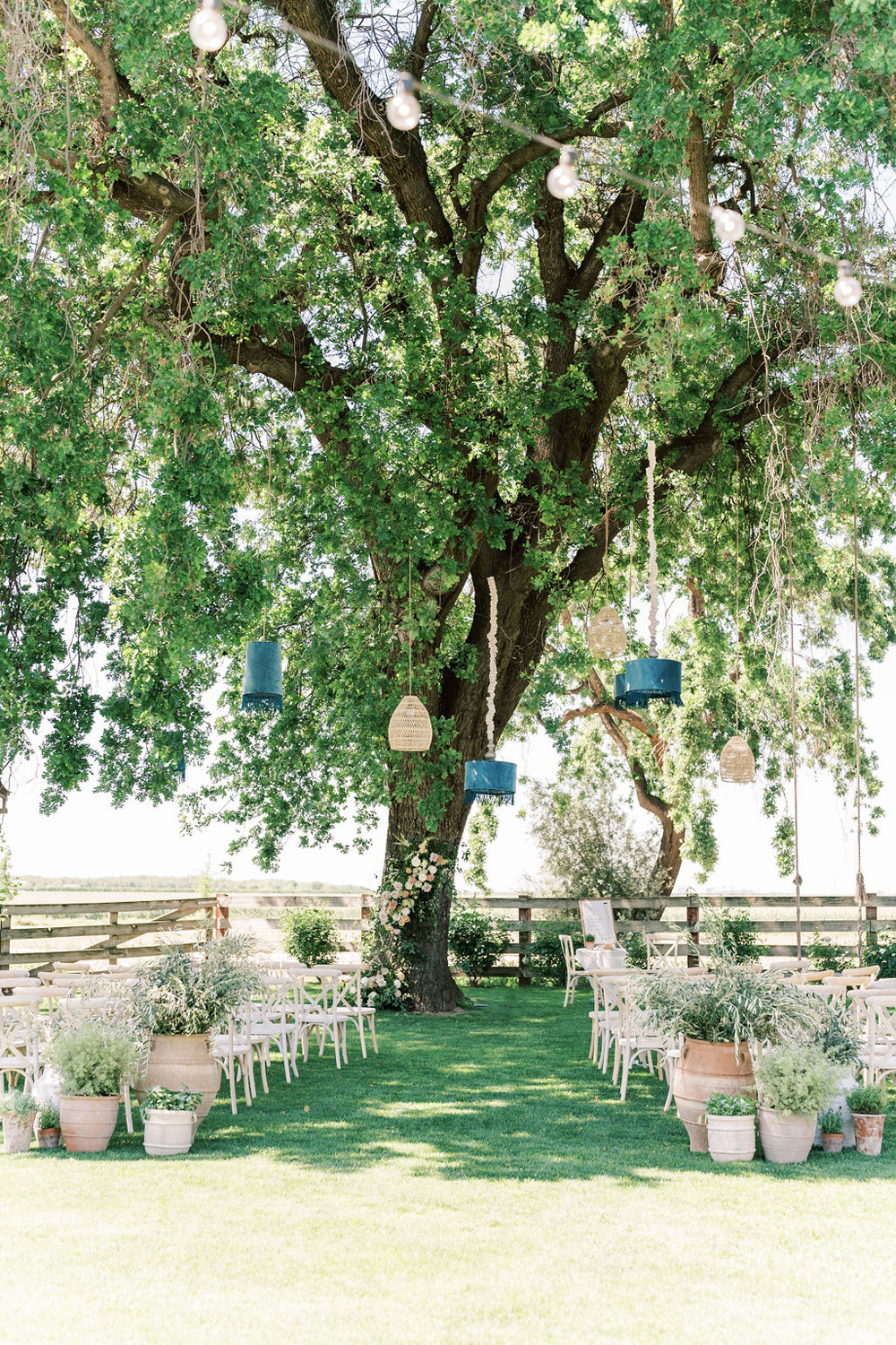 blue hanging lanterns for rustic garden wedding