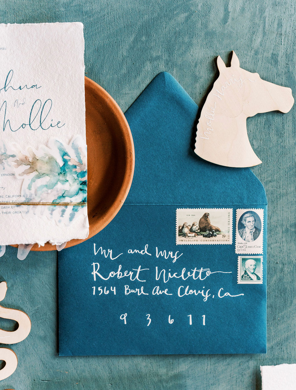 calligraphy and equestrian details for wedding invitations