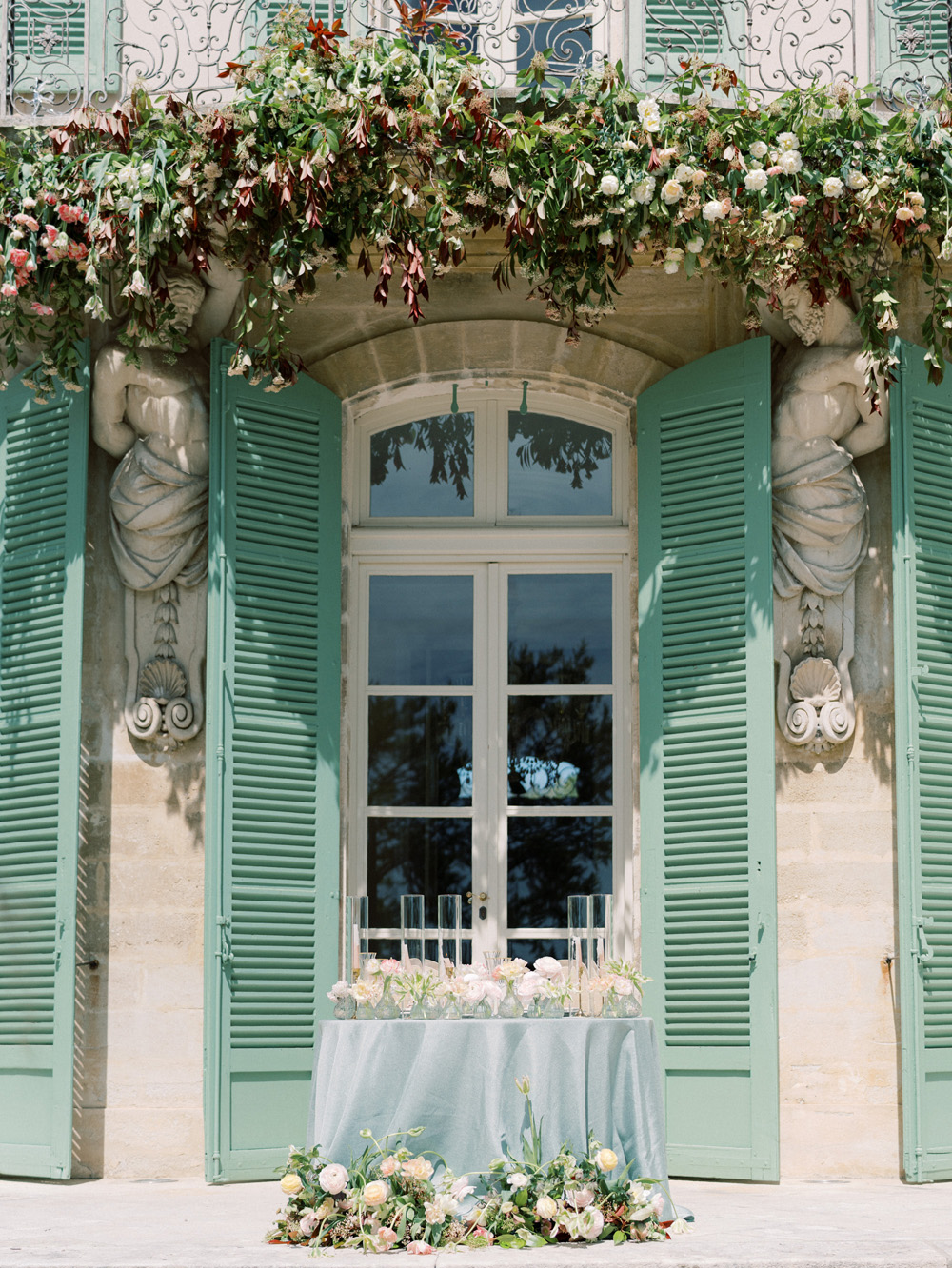 turquoise shutters at Chateau De Tourreau