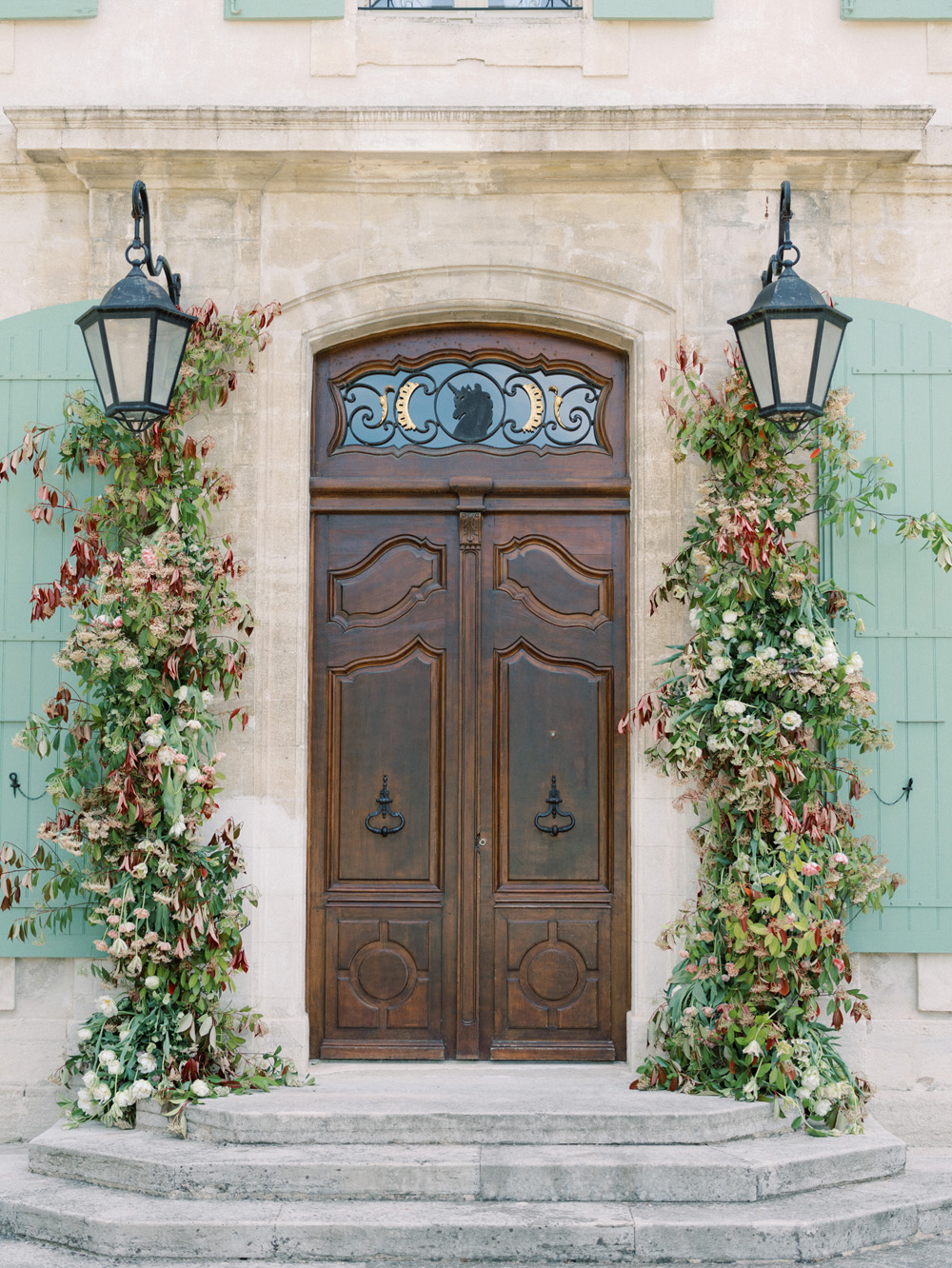 Floral arrangement on wedding doors