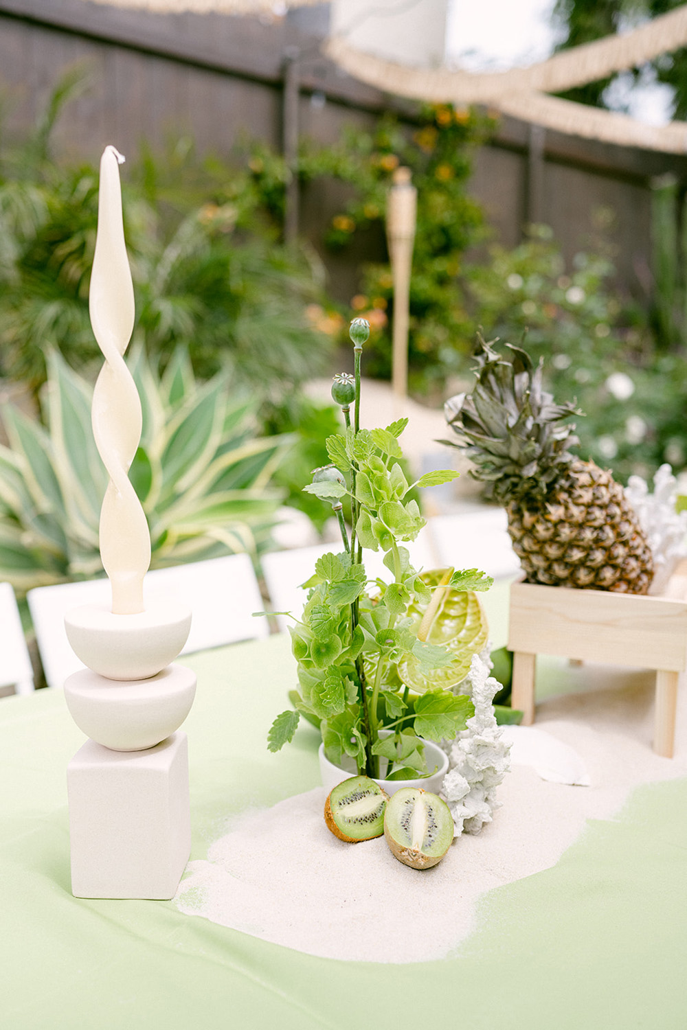 green table for tropical themed birthday