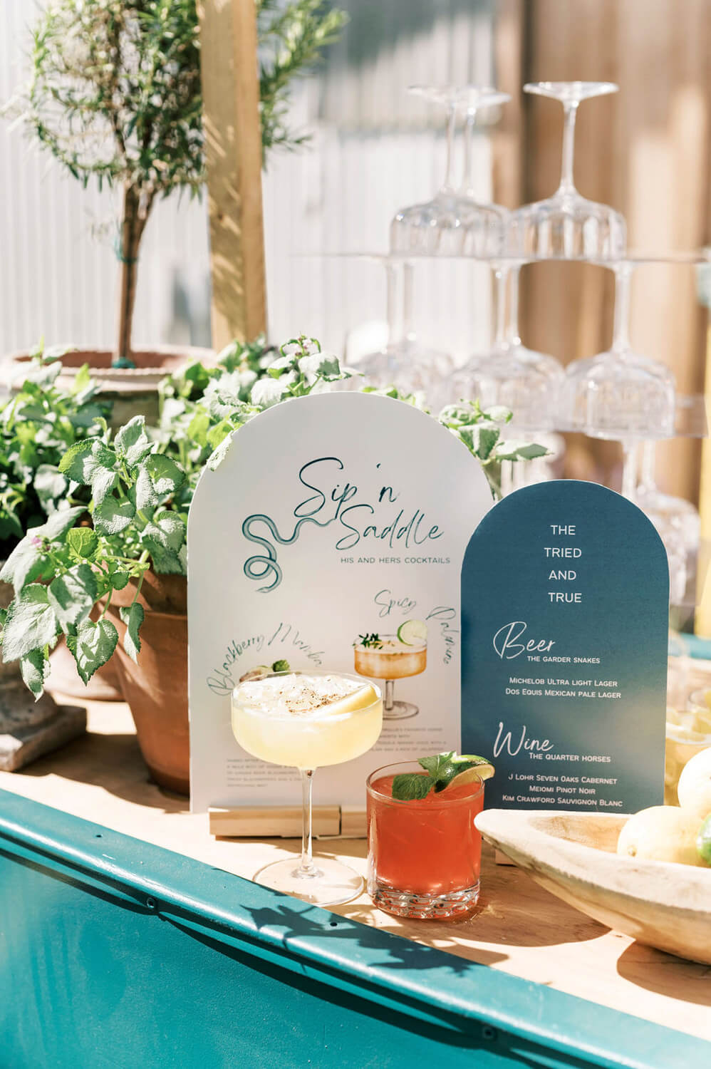blue bar signs and custom cocktails for california wedding