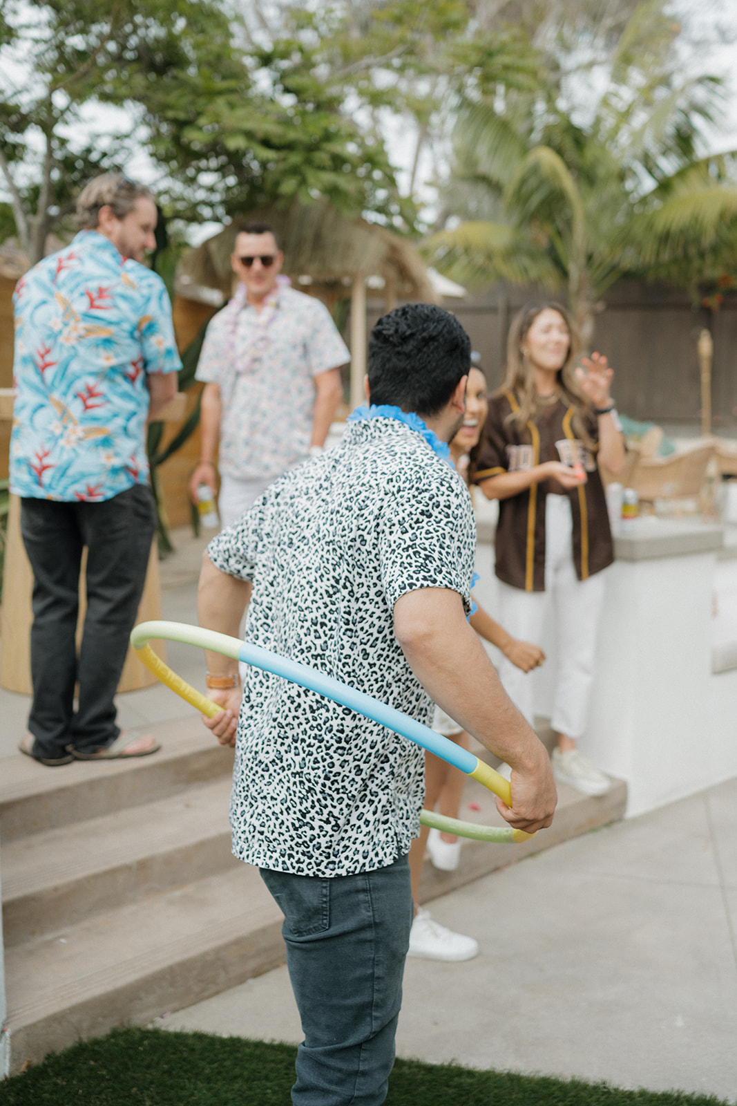 Aloha tropical themed first birthday party with hula hoops