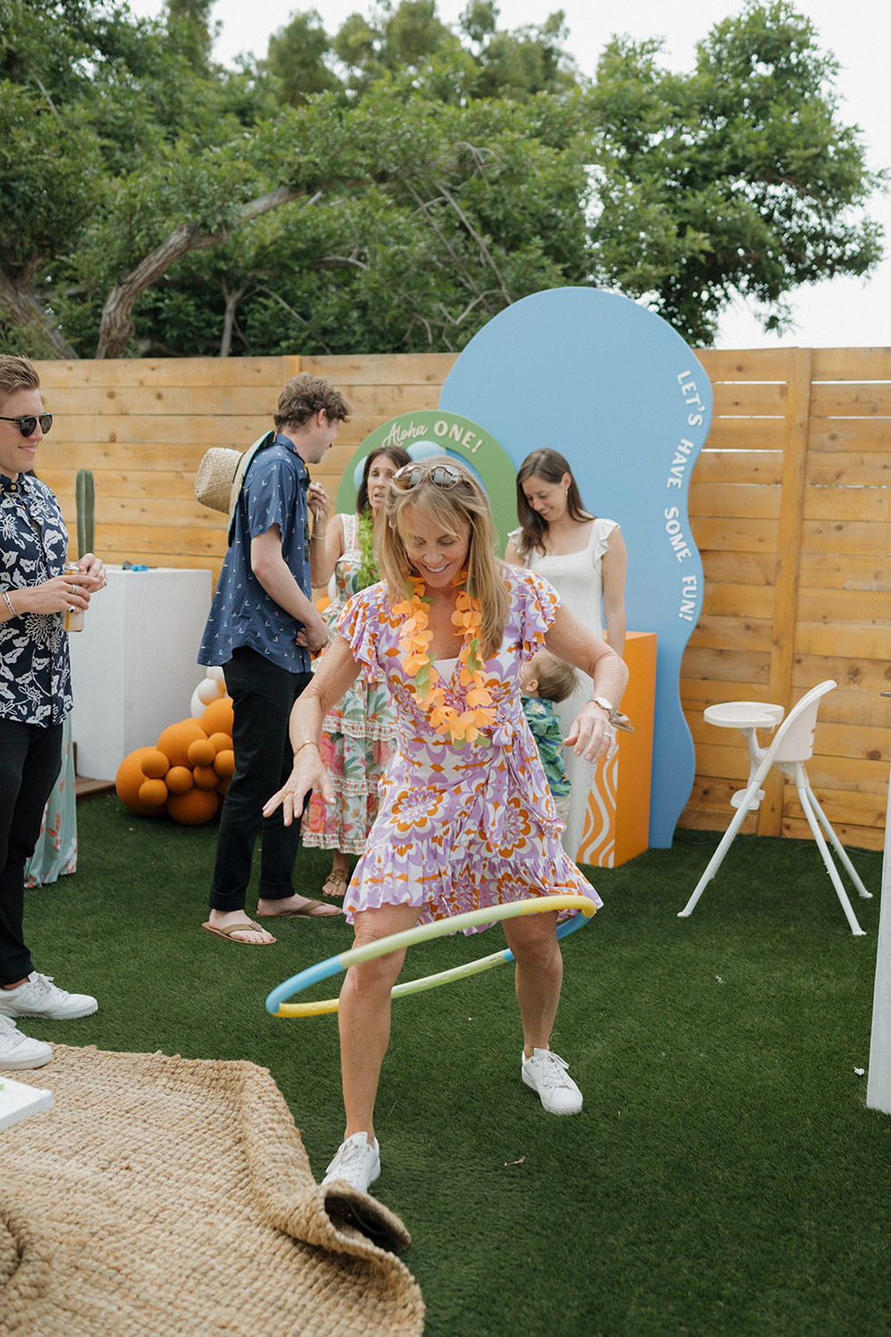 Aloha tropical themed first birthday party with hula hoops