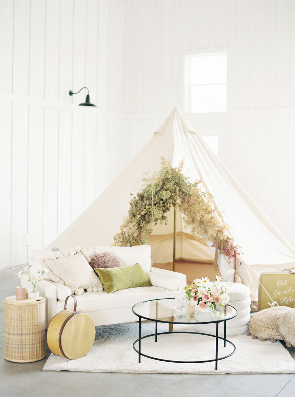 "Our Greatest Adventure Yet" neutral baby shower with floral teepee