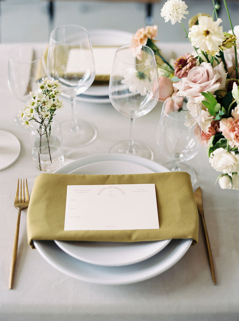 white and gold place setting