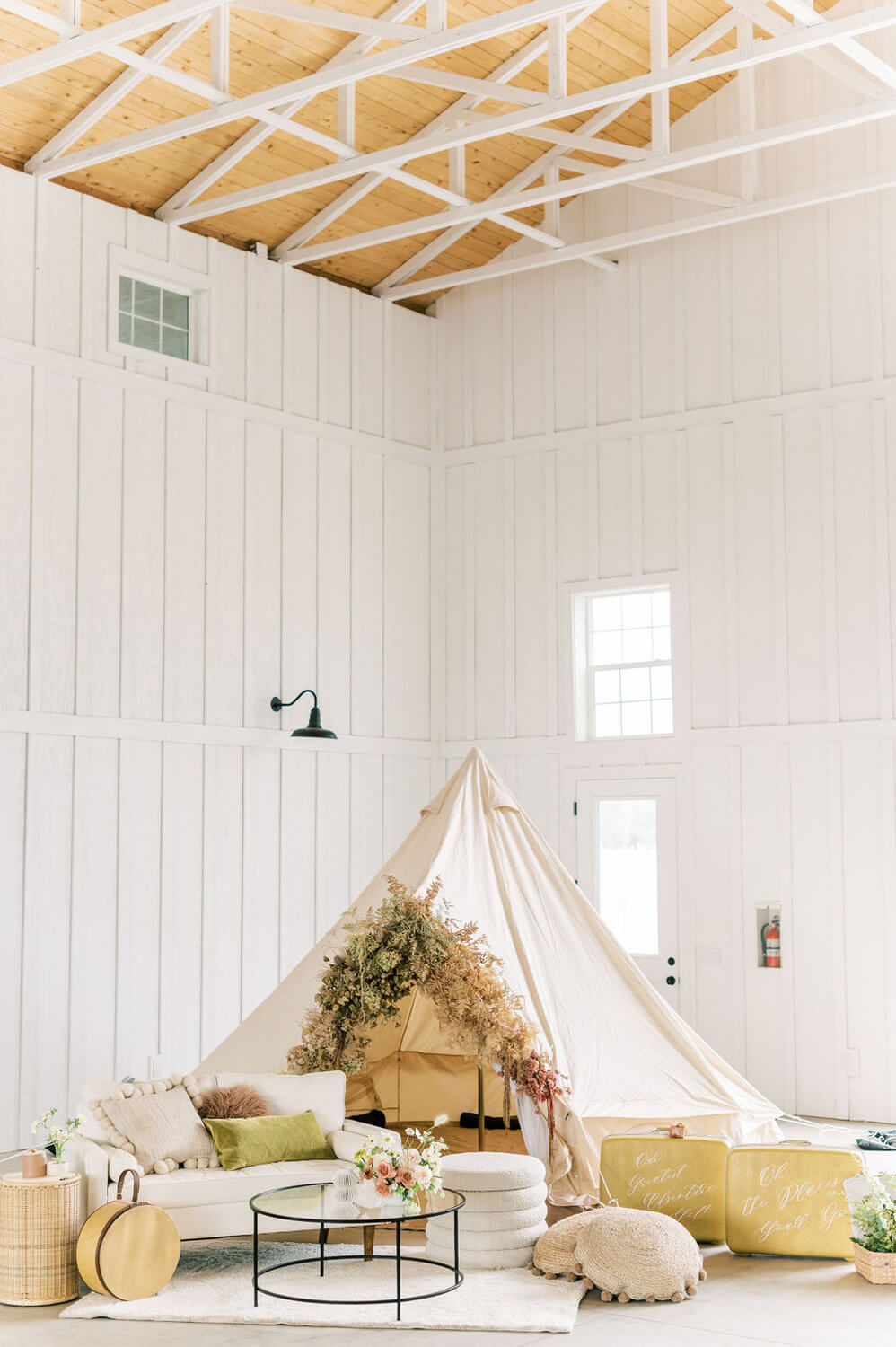 "Our Greatest Adventure Yet" neutral baby shower with fall floral teepee