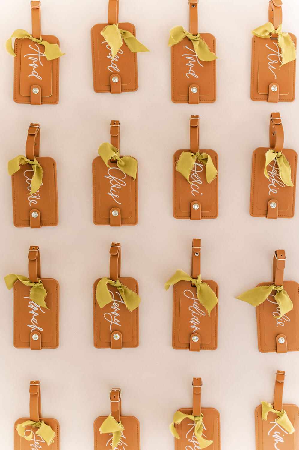 "Adventure Awaits" neutral baby shower luggage tag favors