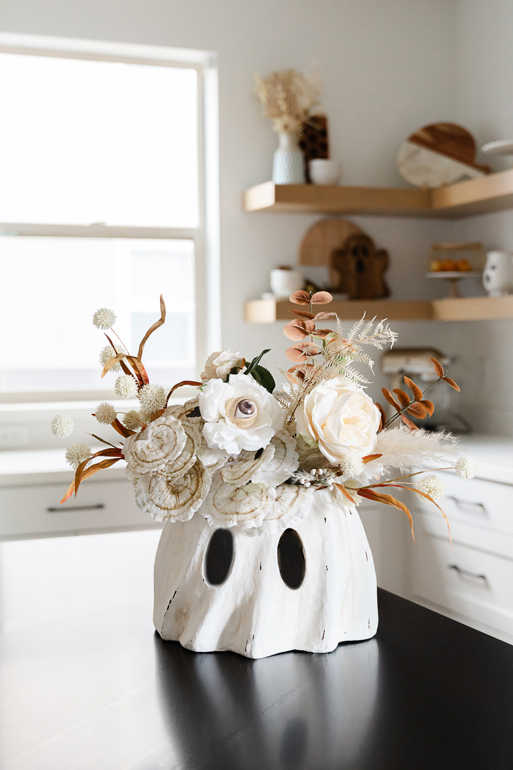 funky fall flowers and ghost vase for modern halloween