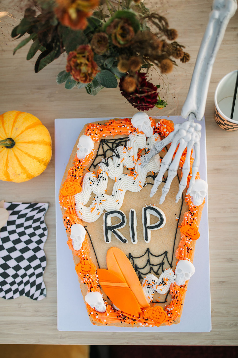 Orange and black Halloween birthday cookie for surf themed California beach birthday