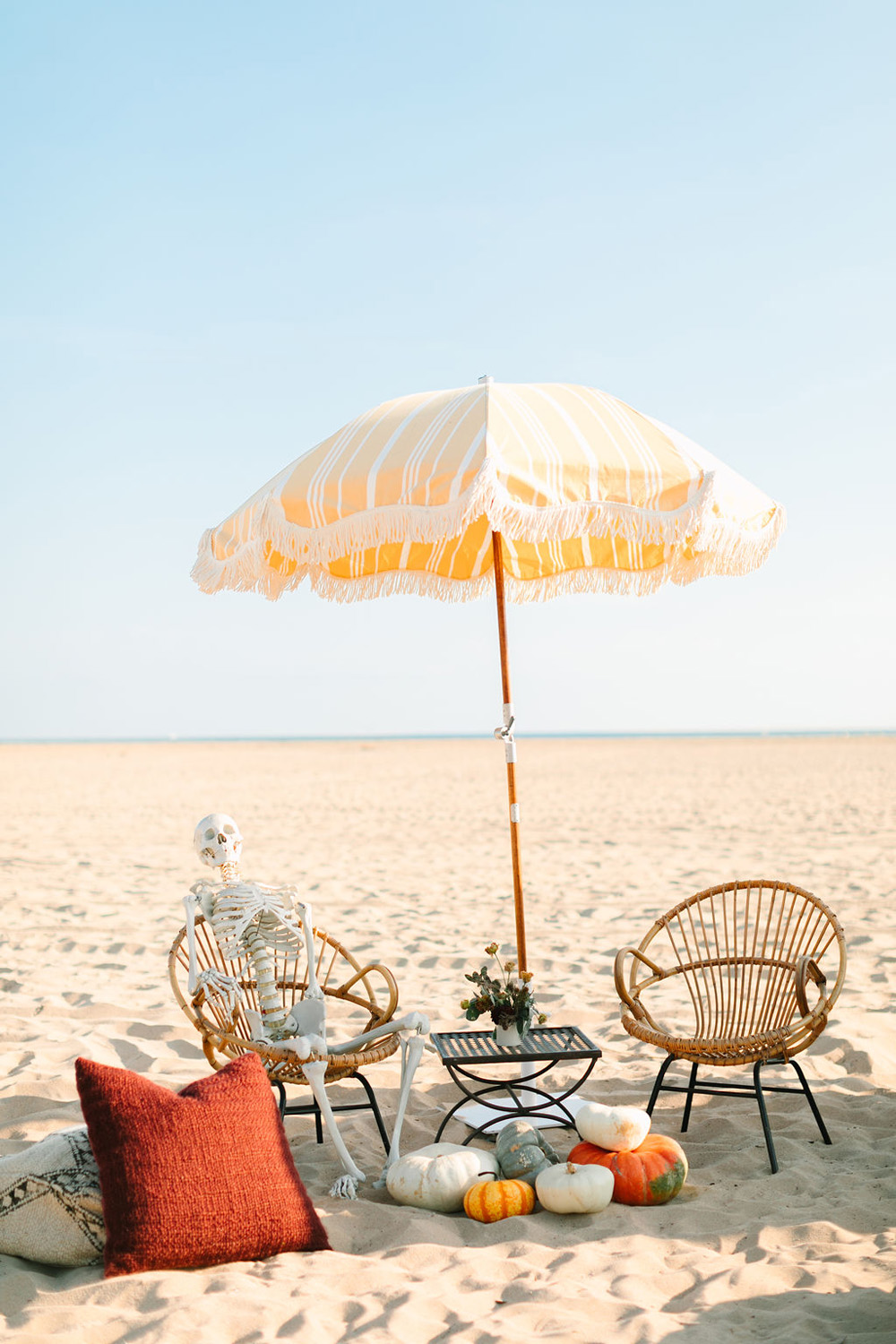 skeleton decor for surf themed halloween party on the beach