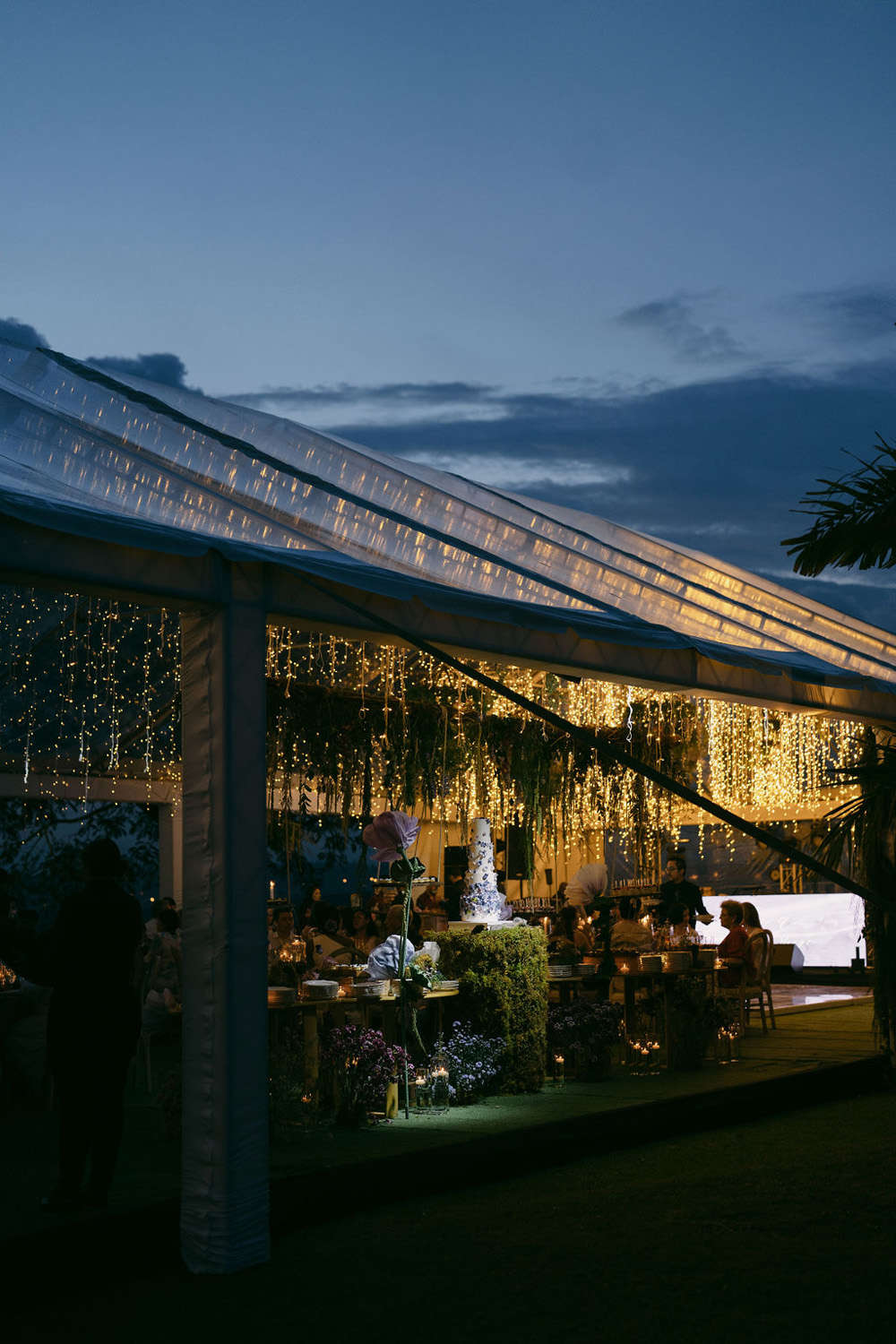 tented reception after sunset