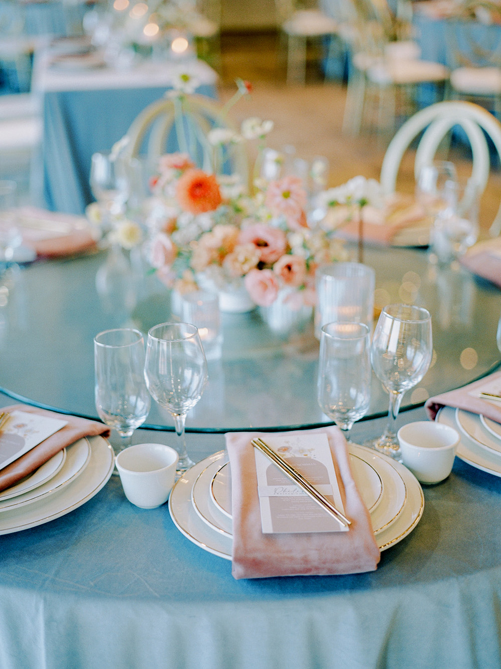 blush and white place settings for restaurant wedding reception