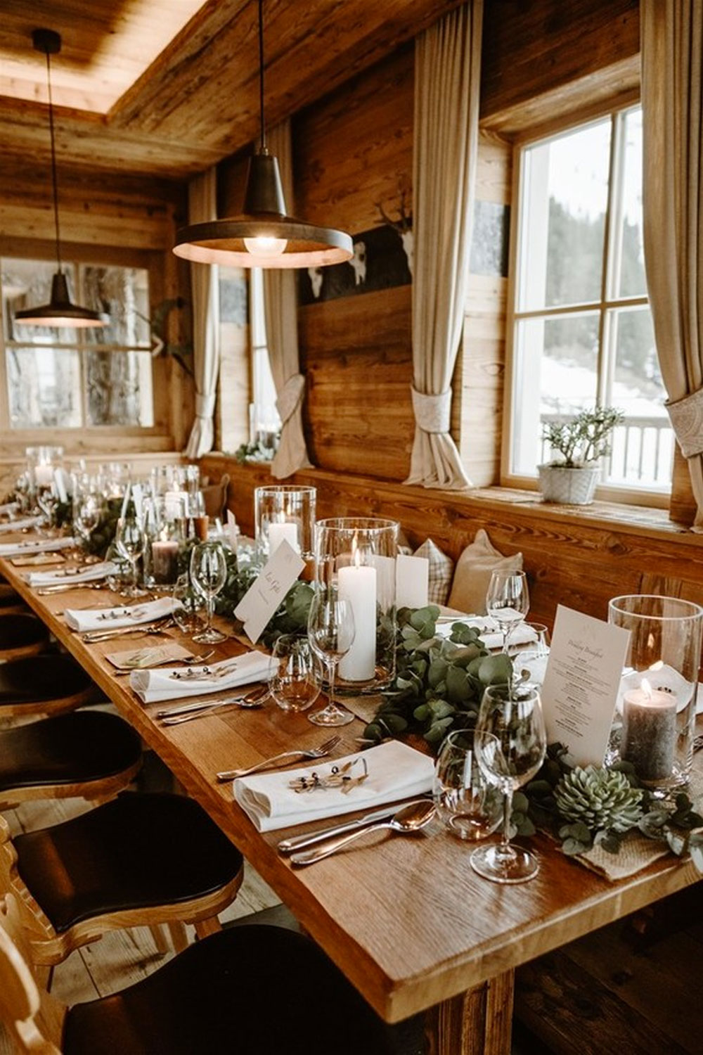 rustic winter wedding table with white and greenery