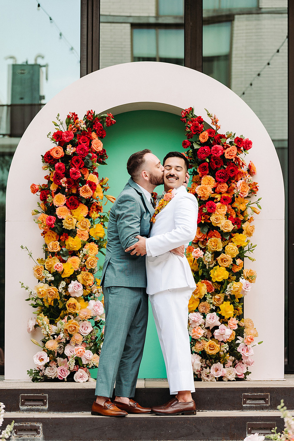 rainbow wedding arch for wedding ceremony