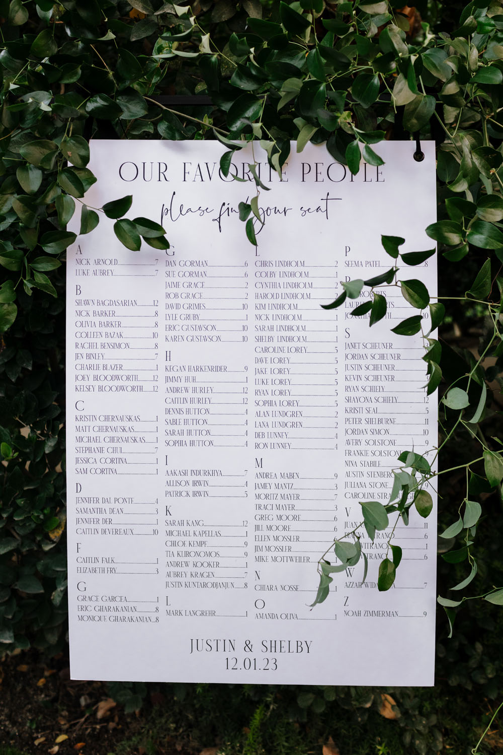 Elegant back and white seating chart for Parker Palm Springs wedding