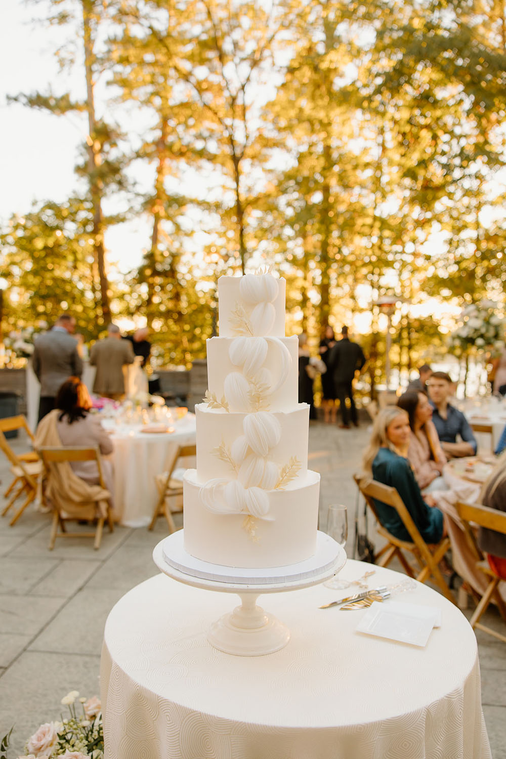 white wedding cake at fall wedding