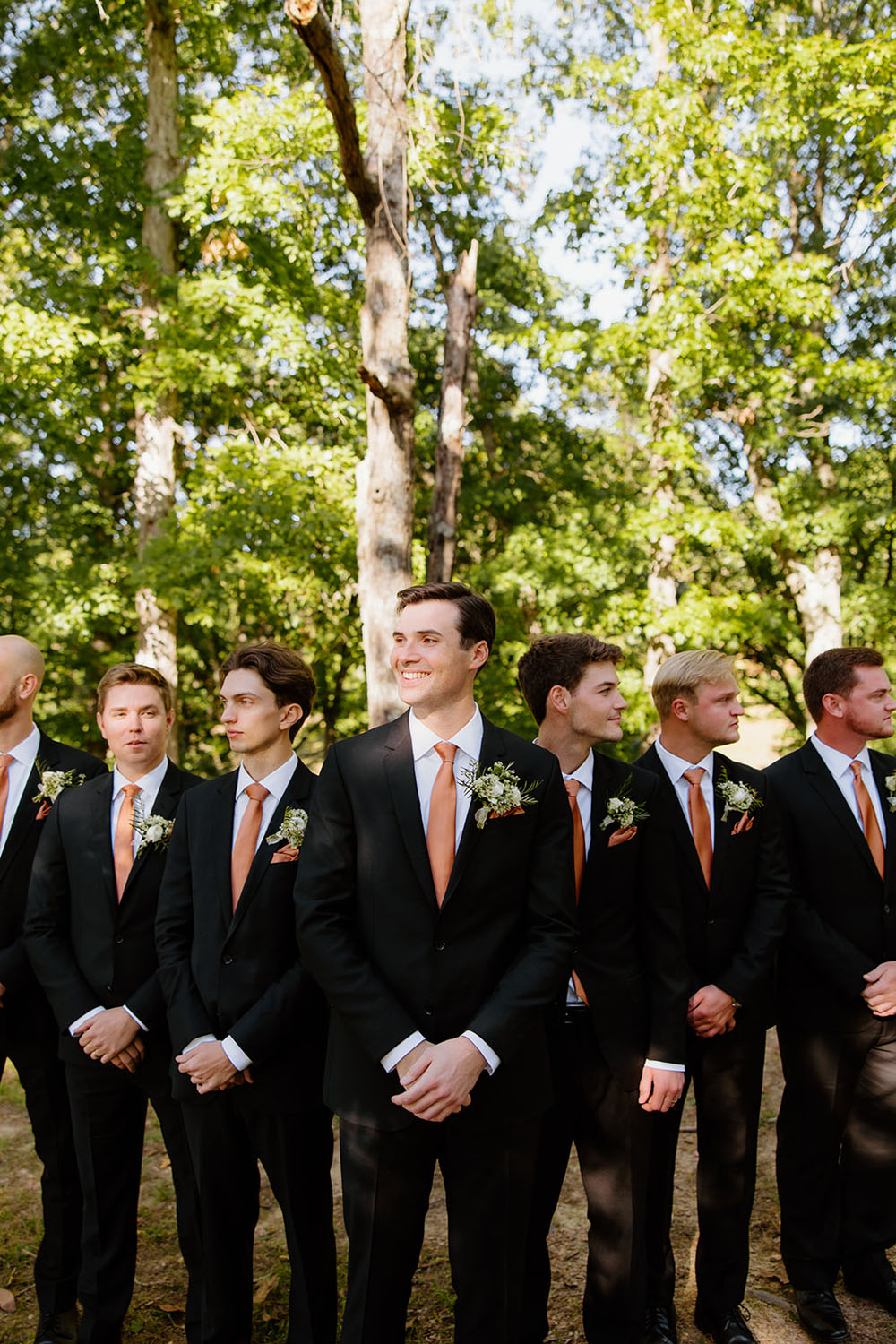 groom and groomsmen in fall Arkansas wedding