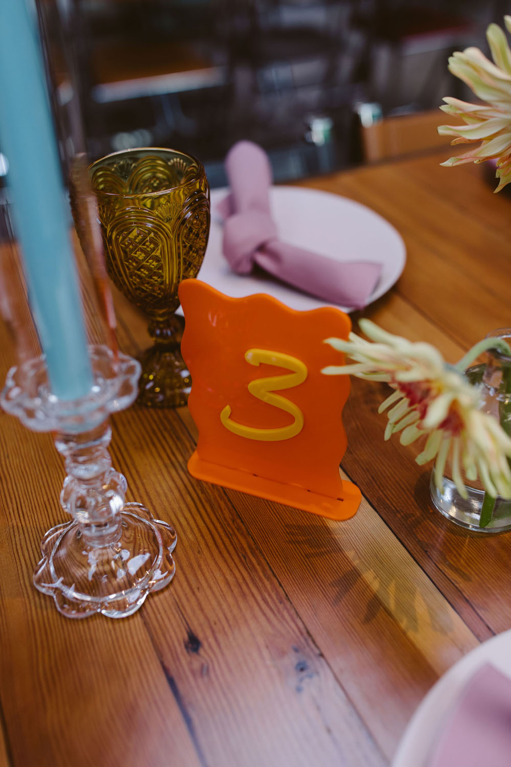 colorful acrylic table numbers for retro wedding