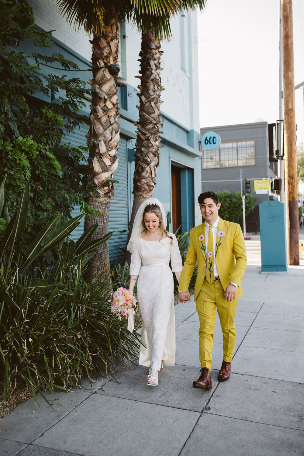 1960s inspired retro wedding portraits with groom in yellow floral suit