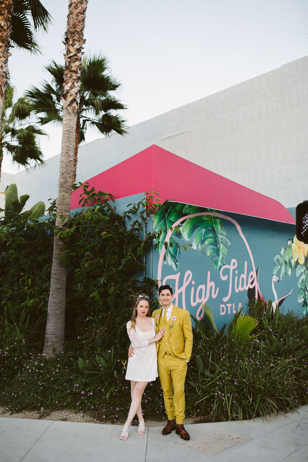 retro bride and groom fashion with yellow groom's suit