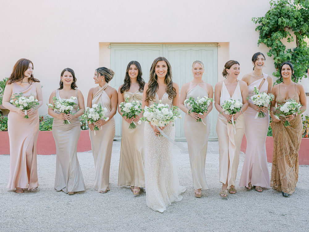 bride with bridesmaids wearing champagne dresses at Bastide du Roy