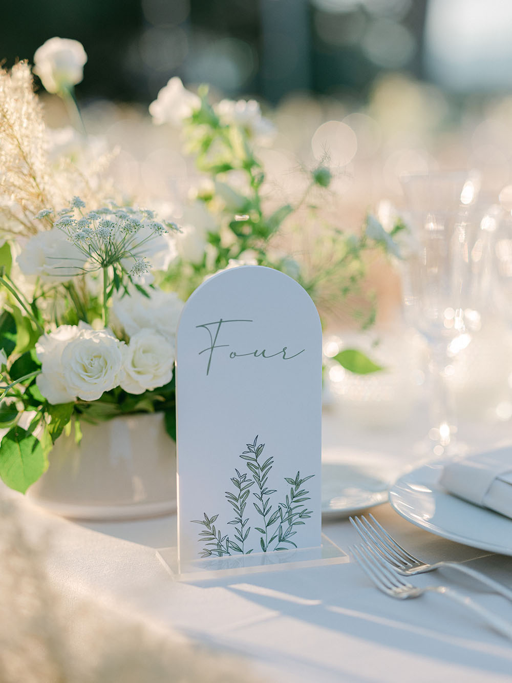 elegant green and white table numbers for French wedding