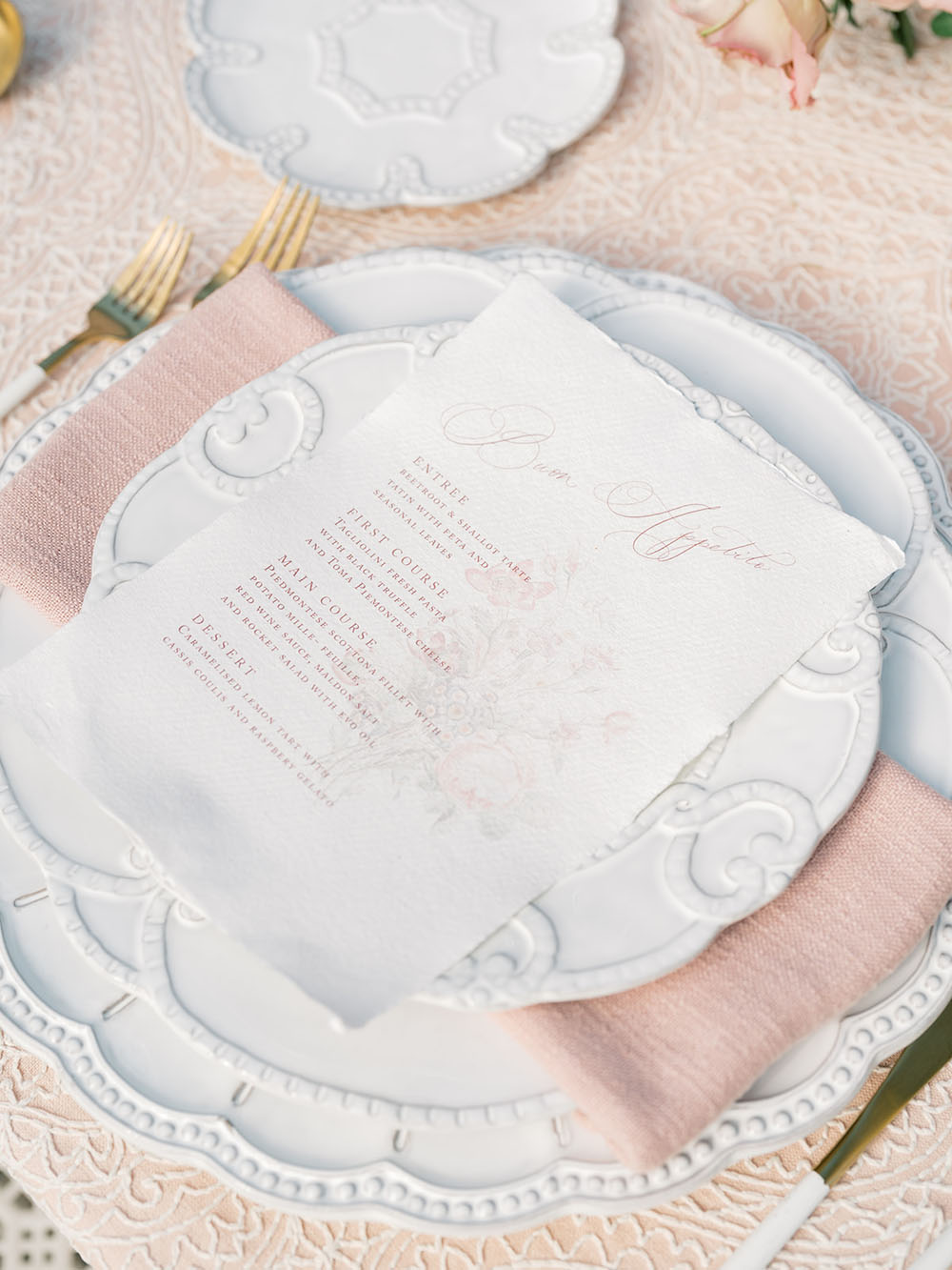 white menu and blush napkins for elegant wedding