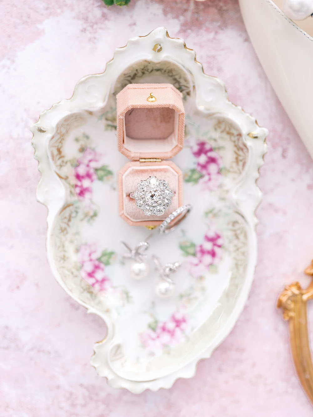 wedding ring and pink ring box