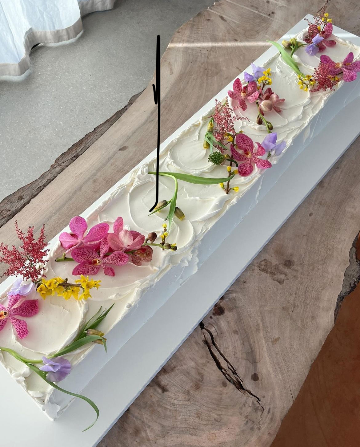 long floral cake by picnicbakedgoods