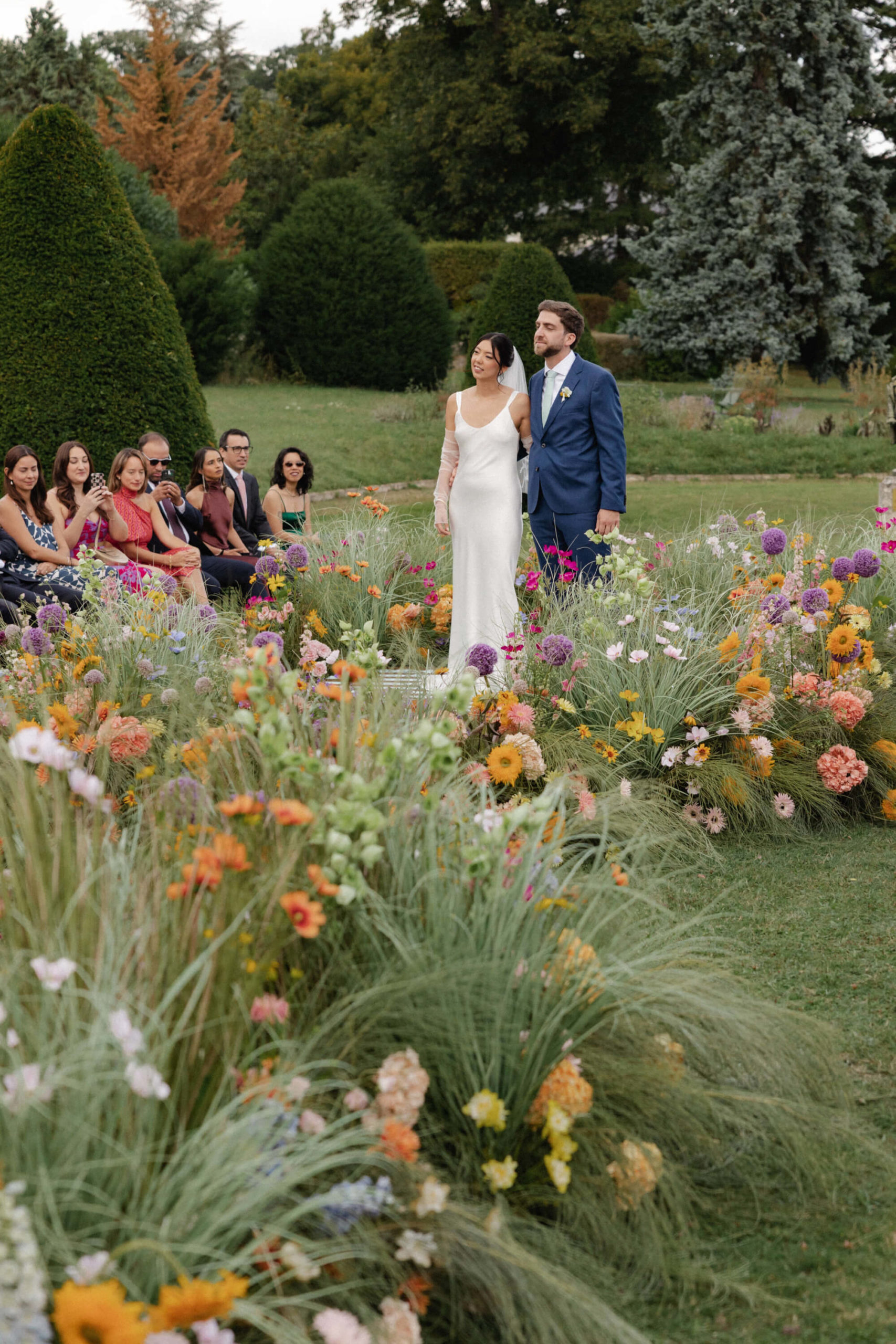 floral lined wedding ceremony aisle
