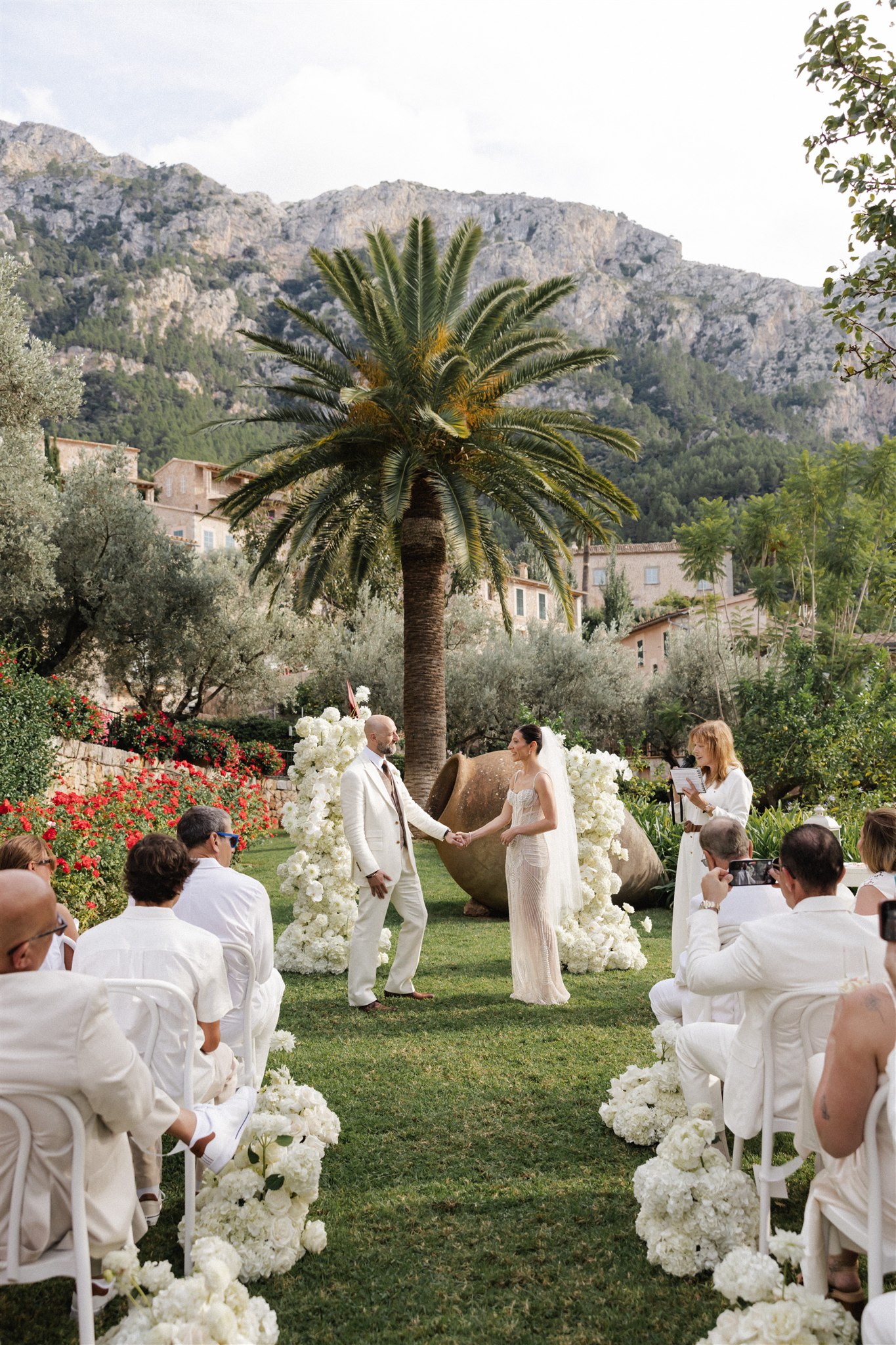 Sweet family ceremony moment with children incorporated into the vows and processional