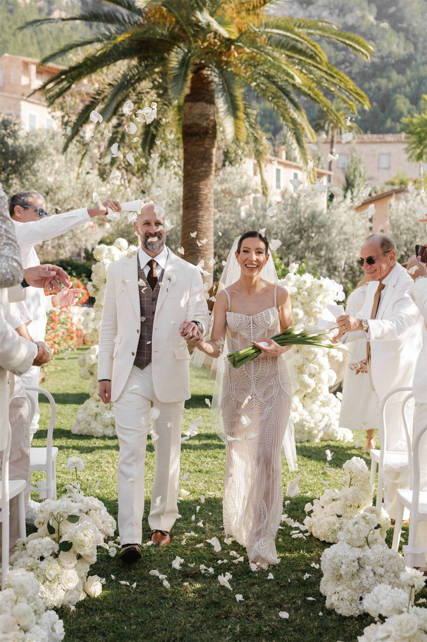 all white wedding bride and groom