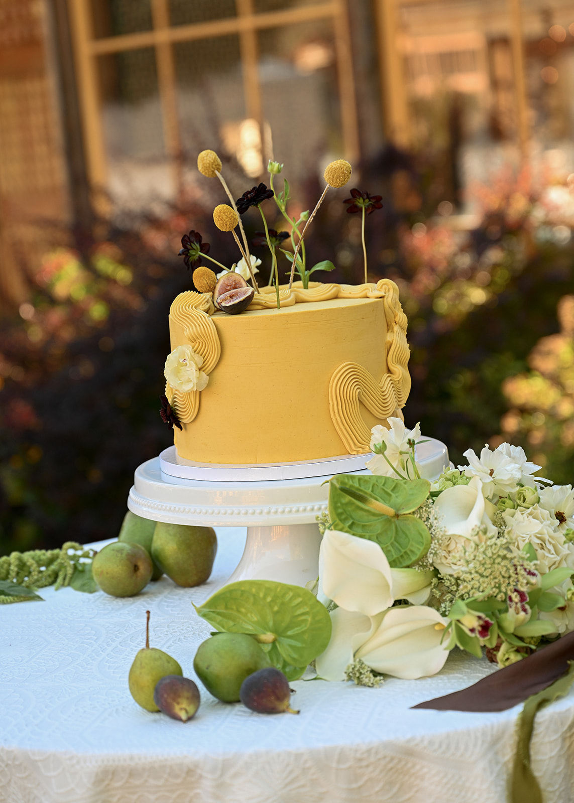Minimal wedding cake with textured buttercream displayed at Mt. Hood Organic Farms