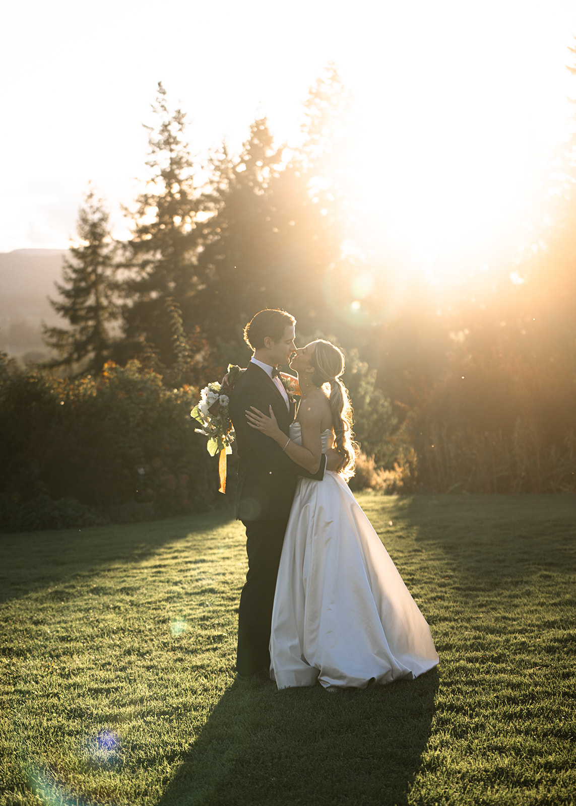 Couple’s wedding portraits captured in golden hour light at Mt. Hood Organic Farms in Oregon