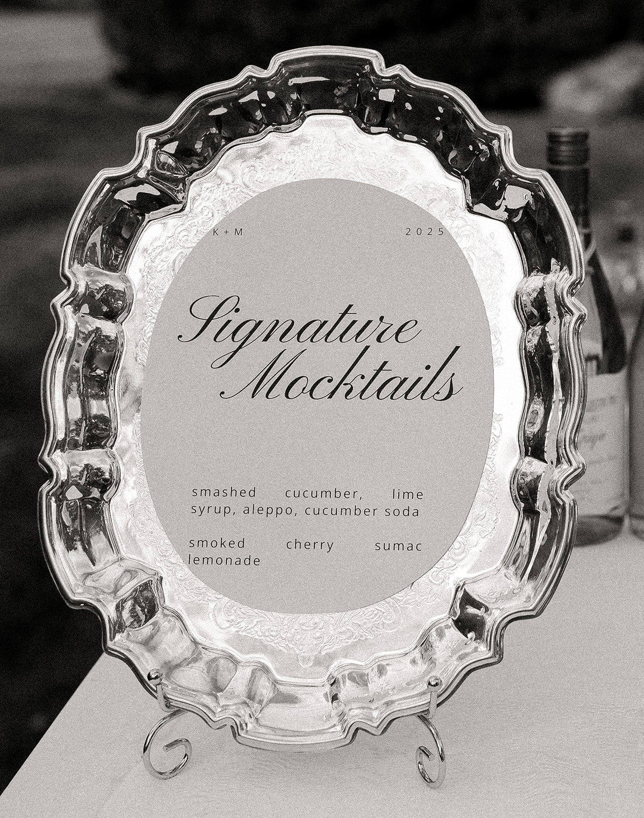 Wedding reception table styled with thrifted silver, vintage details, and timeless design at a private Vermont estate