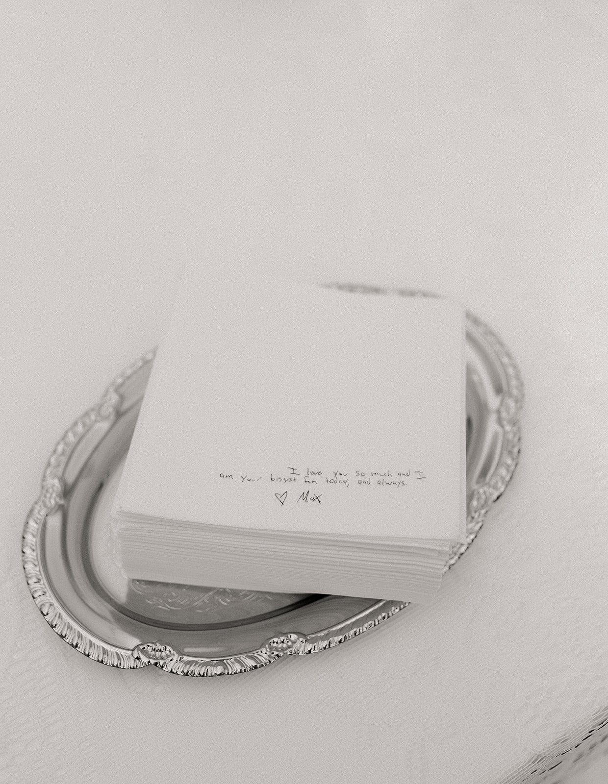 Wedding reception table styled with thrifted silver, vintage details, and timeless design at a private Vermont estate