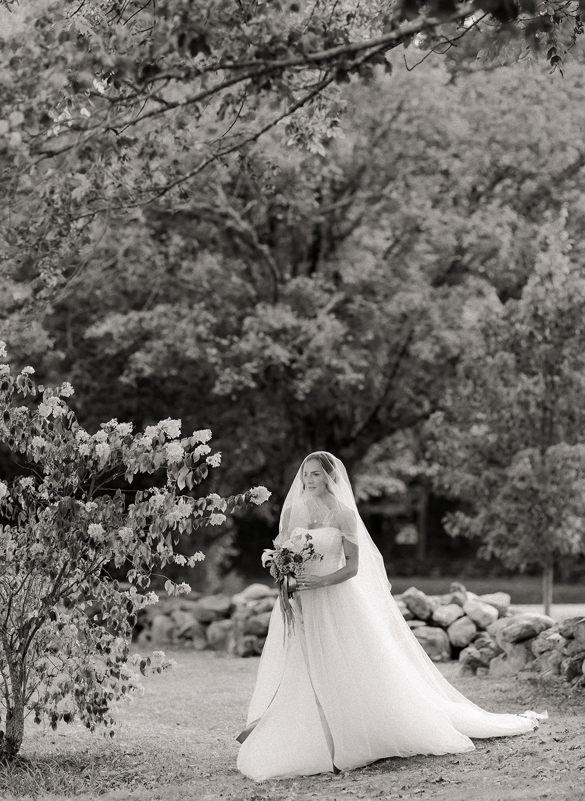 Bride wearing a timeless, classic wedding dress during a private estate wedding weekend in Vermont
