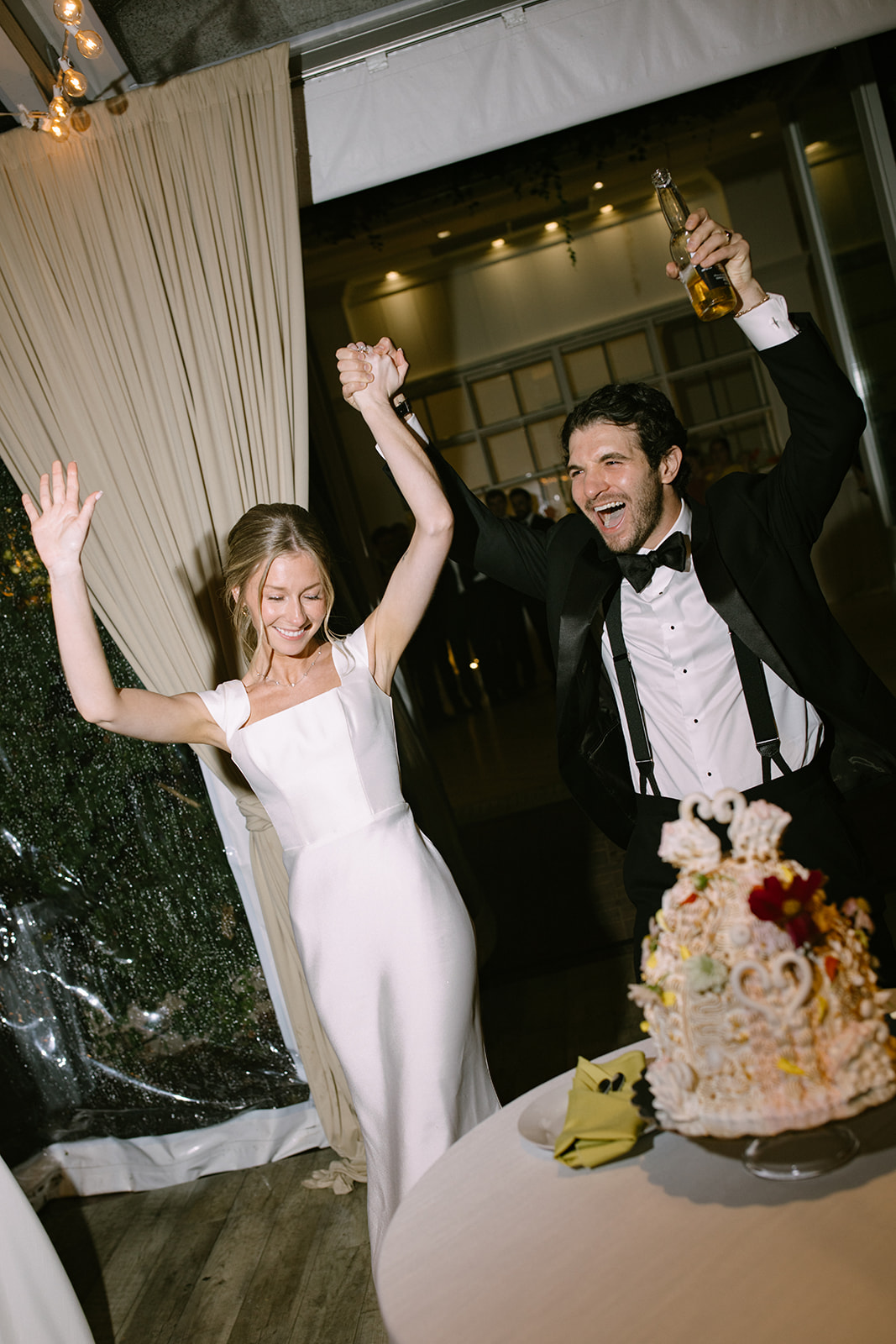 bride and groom cake cutting