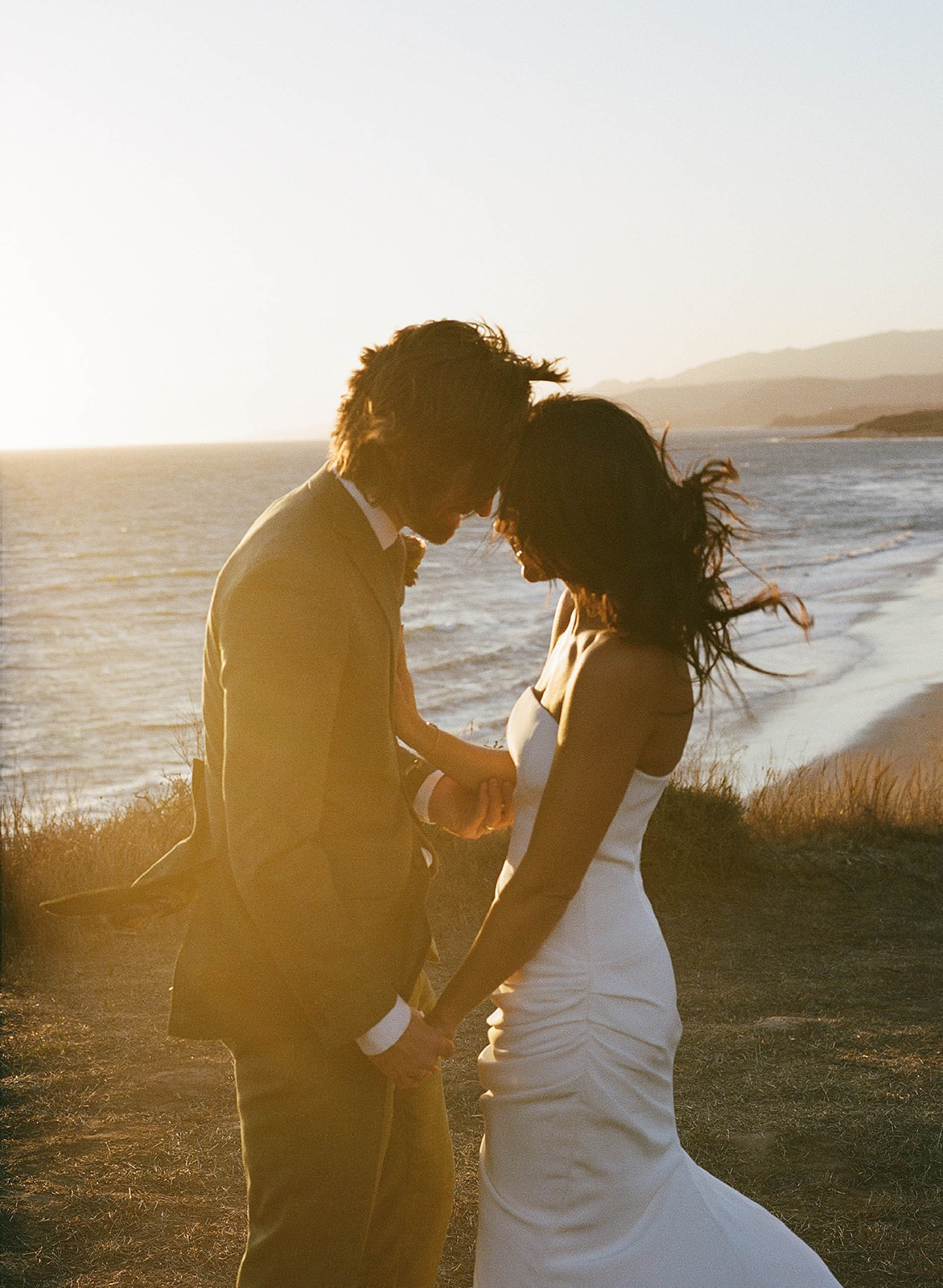 Bride and groom portrait at Dos Pueblos Orchid Farm Santa Barbara photographed by Nikki Strekowski