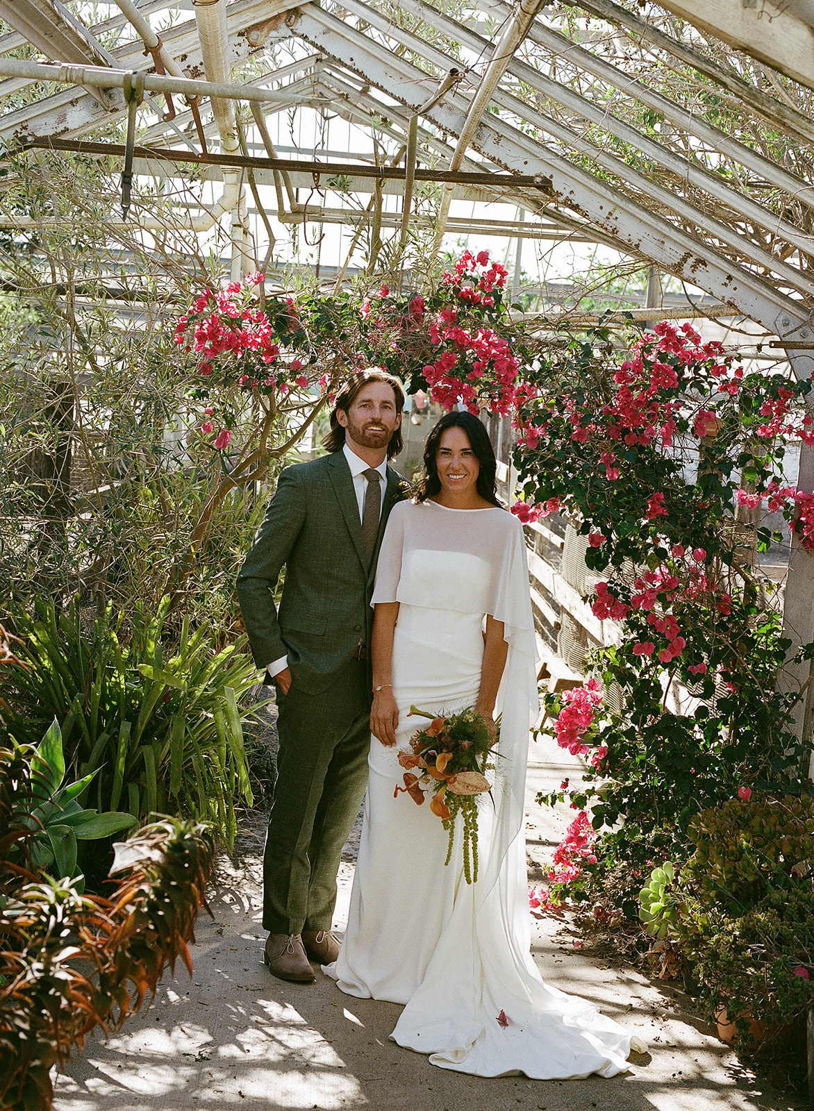 Bride and groom portrait at Dos Pueblos Orchid Farm Santa Barbara photographed by Nikki Strekowski