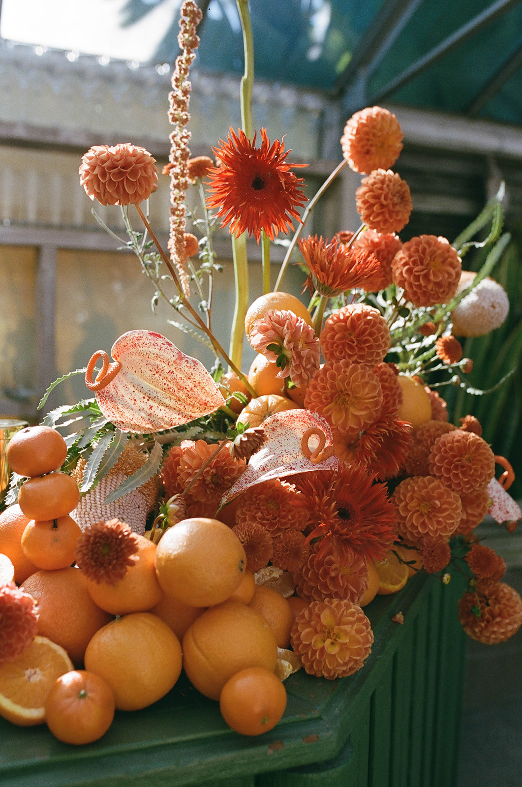 wedding florals with oranges