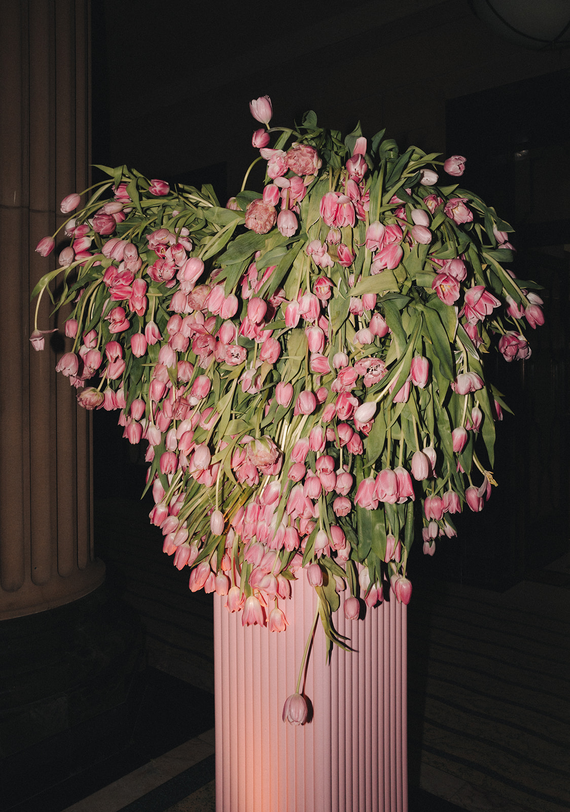 Dramatic tulip installation for an intimate Sydney library wedding reception
